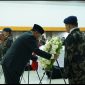 Wakil Menteri Kelautan dan Perikanan; *Didit Herdiawan Ashaf* (tengah berpeci) mewakili Menteri KKP, Sakti Wahyu Trenggono saat memimpin upacara Prosesi pelepasan para jenazah korban Pesawat ATR 42-500 yang dilaksanakan bertempat di kampus Politeknik Ahli Usaha Perikanan (AUP) Pasar Minggu, Jakarta Selatan pada, Minggu (25/1/2026).